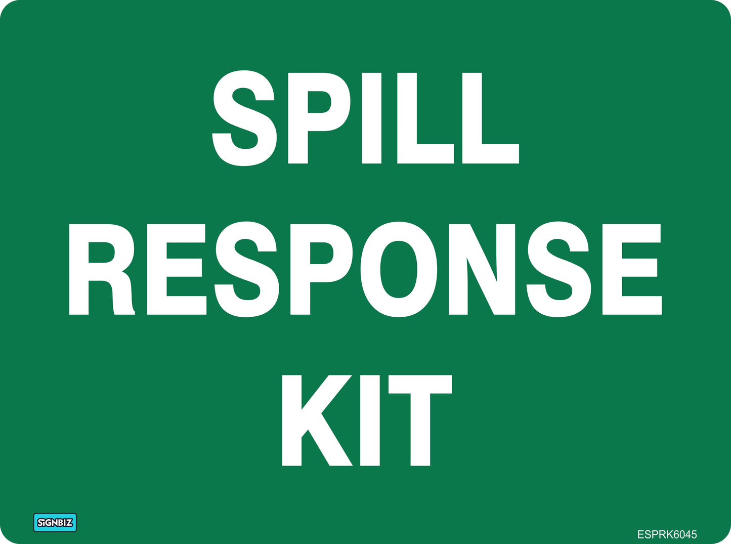 A green rectangular sign displays "EMERGENCY SPILL RESPONSE KIT" in bold white letters, clearly marking the location of essential safety equipment.