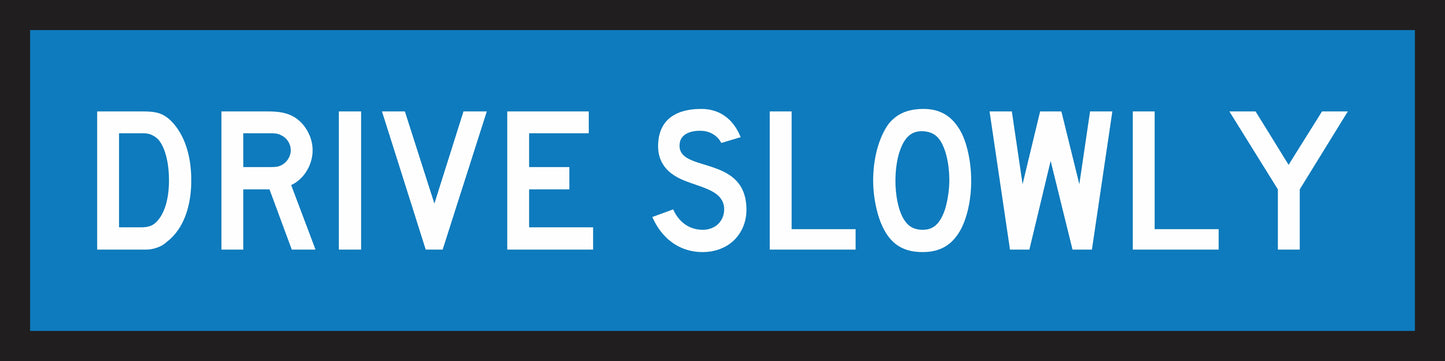 The Drive Slowly (MMS Insert) is a blue rectangular sign with bold white capital letters and a black border, designed for sign frames to allow easy insertion and interchange of messages.