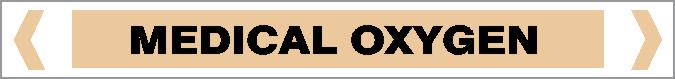 A rectangular beige "Pipe Marker - GAS - MEDICAL OXYGEN" sign features black uppercase "MEDICAL OXYGEN" text centered, with beige inward-pointing arrows on both the left and right sides.