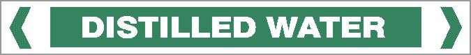 A Pipe Marker labeled "DISTILLED WATER" in bold, capital letters features green and white colors, with white arrows on each side pointing inward.