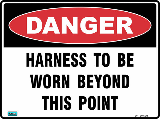 The Danger Harness To Be Worn sign meets AS/NZ 1319-1994, displaying a red "DANGER" oval and the message "HARNESS TO BE WORN BEYOND THIS POINT" in bold black capitals on white—ideal for clear Danger Signs placement.