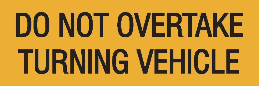 The Truck Do Not Overtake C1 Reflective 300 x 100 is a yellow sign with black text, "DO NOT OVERTAKE TURNING VEHICLE," made from C1 reflective material for enhanced visibility.