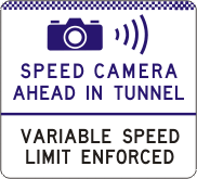 The G6-330-2n sign features a camera icon with signal waves and purple text on white: "Speed camera ahead in tunnel. Variable speed limit enforced.
