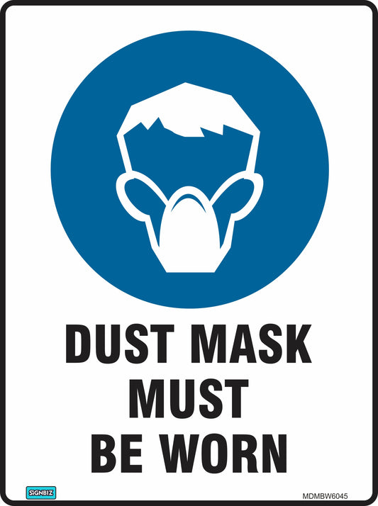 A blue and white Mandatory Mask Mine Site safety sign displays a person wearing a dust mask with the bold text "DUST MASK MUST BE WORN" below, ensuring workplace compliance.