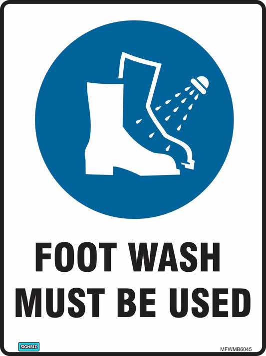 The Mandatory Foot Wash sign features a boot washed by water and bold text "FOOT WASH MUST BE USED," promoting cleanliness and safety in the workplace as a required precaution.