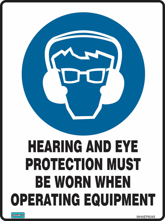 The "Mand Hear & Eye Prot When Op" sign shows an icon of a person with safety glasses and hearing protection, stating: "HEARING AND EYE PROTECTION MUST BE WORN WHEN OPERATING EQUIPMENT," promoting workplace safety compliance.