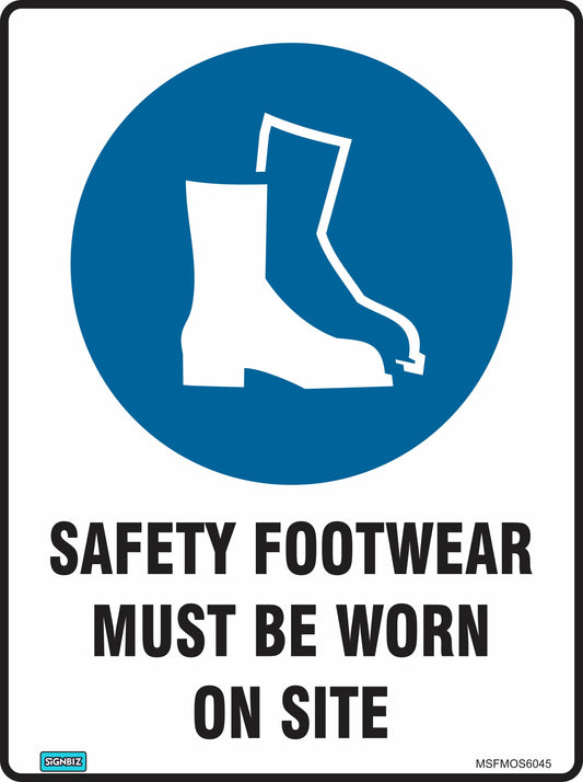 The Mand Safety F/Wear Req On Site sign displays a safety boots icon in a blue circle above "SAFETY FOOTWEAR MUST BE WORN ON SITE" in bold black on white, providing essential workplace safety guidance.