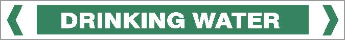 The Pipe Marker - WATER - DRINKING WATER is a green rectangular sign with white, all-capital "DRINKING WATER" text and inward-pointing white arrow shapes on each side.