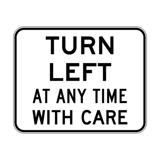 The R2-16n Turn Left At Any Time With Care is a rectangular NSW regulatory road sign featuring a white background, black border, and bold uppercase message: "TURN LEFT AT ANY TIME WITH CARE.