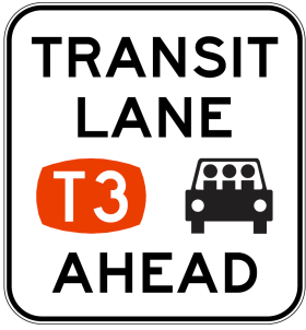 The R7-230n Transit Lane T3 Ahead is a rectangular Australian road sign featuring "TRANSIT LANE T3 AHEAD," an image of a car with three people, and "T3" on orange. It uses reflective material for high visibility and suits NSW regulatory signage standards.