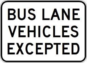 The R9-239n - Bus Lane Vehicles Excepted is a rectangular white reflective regulatory road sign with a black border and black text reading, “BUS LANE VEHICLES EXCEPTED,” commonly used for NSW regulatory purposes.