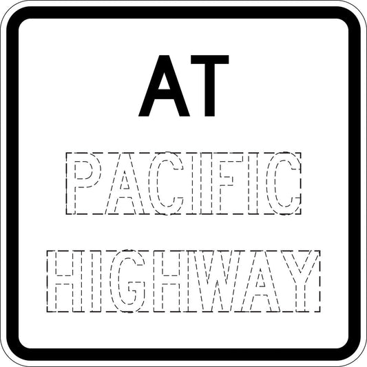 The R9-8 - Location Plate is a rectangular regulatory road sign to Australian Standards, displaying “AT” in bold black letters above the outlined words “PACIFIC HIGHWAY” on a white background with a black border.