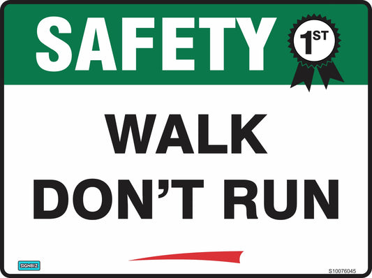 The "Safety First Walk Don't Run" sign is a rectangular safety sign with a green header labeled "SAFETY 1st" and bold black "WALK DON'T RUN" text on white, compliant with AS/NZS 1319 workplace safety standards.