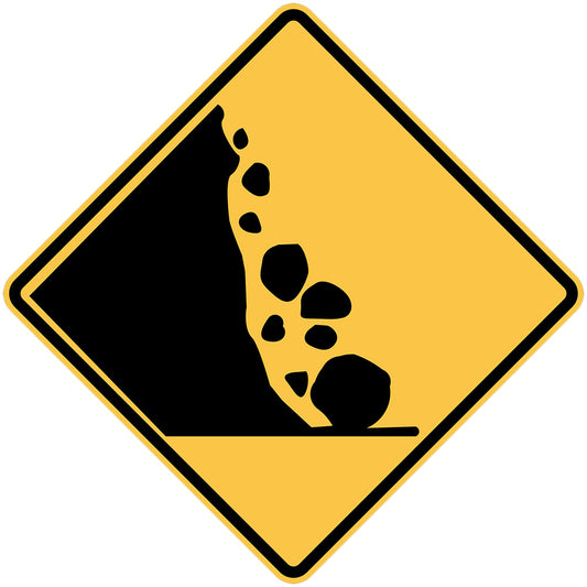 The W5-42(L) Fallen Rocks (Left Symbolic) sign is a yellow diamond-shaped road sign with a black graphic showing rocks falling from a cliff, warning of potential falling rocks or rockslide hazards on the left.