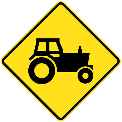The W5-50 - Farm Machinery (Symbolic) sign is a yellow diamond with a black tractor symbol, warning drivers of possible farm machinery crossing or presence on or near the road.