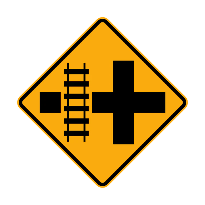 The W7-13(L) sign is a yellow diamond with a black cross and vertical rail lines on the left, warning drivers of a railway crossing ahead at an intersection via a diagrammatic illustration.