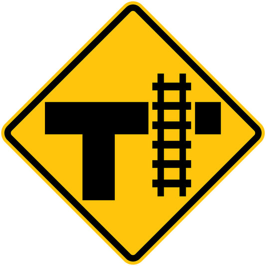The W7-17(R) sign is a yellow, diamond-shaped road sign with a black T-intersection and railroad tracks crossing the top bar, indicating a rail crossing ahead at a T-intersection (R illustrated).