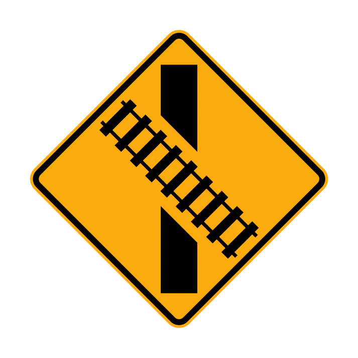 The W7-9(R) sign is a yellow diamond with a black diagram showing an oblique railway crossing ahead, indicating a Railway Crossing Ahead (Right illustrated).