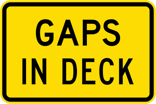 The W8-249n – Gaps In Deck sign is a yellow road sign with a black border and the words "GAPS IN DECK" in bold, black, uppercase letters.